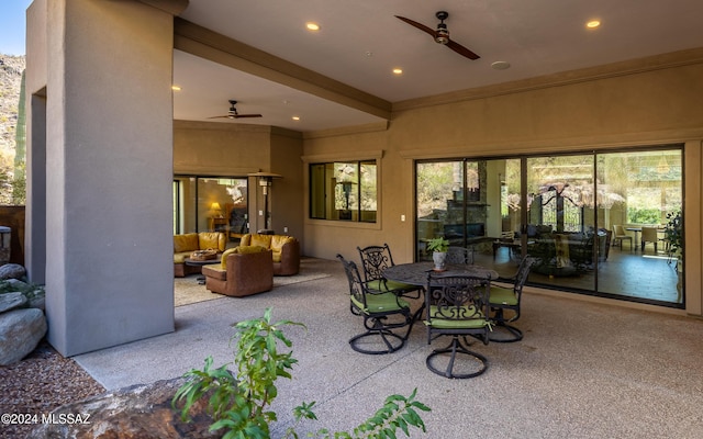 15251 N Dove Canyon Pass, Marana, AZ 85658 - view of patio featuring a ceiling fan, an outdoor hangout area, and outdoor dining space