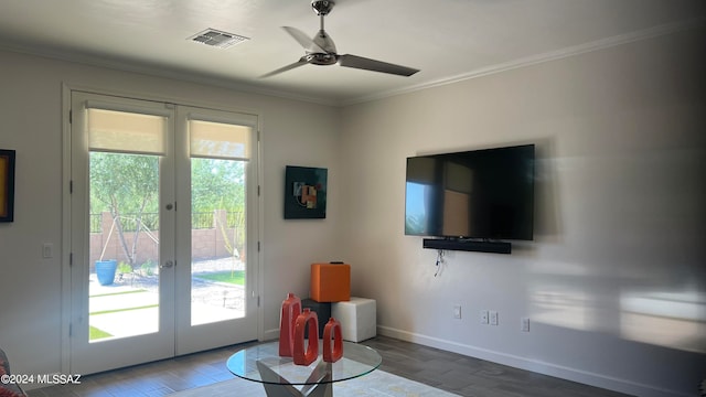 living room featuring french doors, ceiling fan, crown molding, and hardwood / wood-style floors