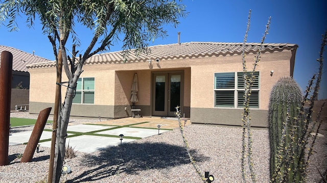 back of house featuring a patio area