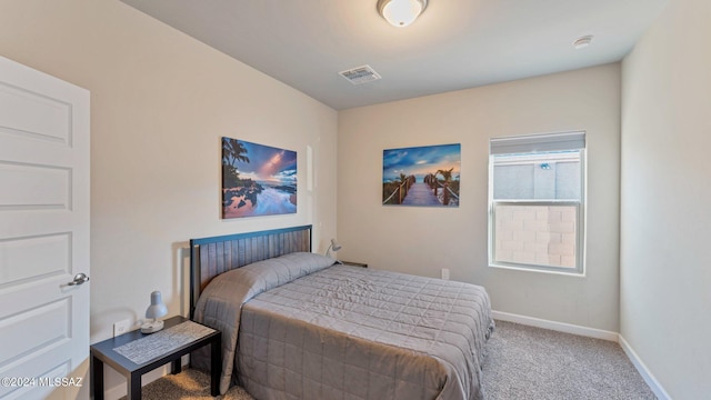 bedroom featuring carpet