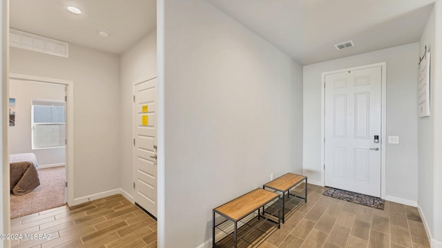 foyer featuring hardwood / wood-style flooring