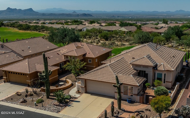 bird's eye view with a mountain view