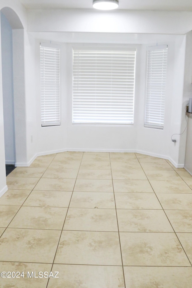 2215 S Lamonica Way, Safford, AZ 85546 - tiled empty room featuring baseboards