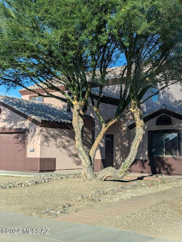 2215 S Lamonica Way, Safford, AZ 85546 - view of side of property with stucco siding and a tiled roof