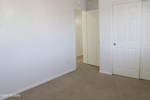 2215 S Lamonica Way, Safford, AZ 85546 - unfurnished bedroom featuring carpet, baseboards, and a closet