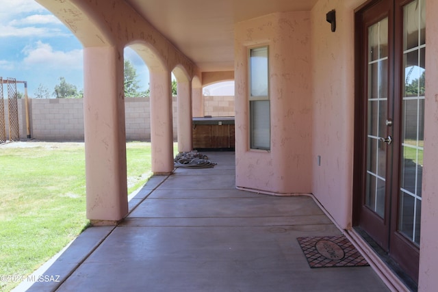 2215 S Lamonica Way, Safford, AZ 85546 - view of patio / terrace with a hot tub and french doors