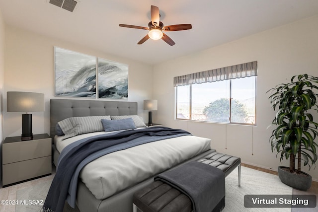 carpeted bedroom with ceiling fan