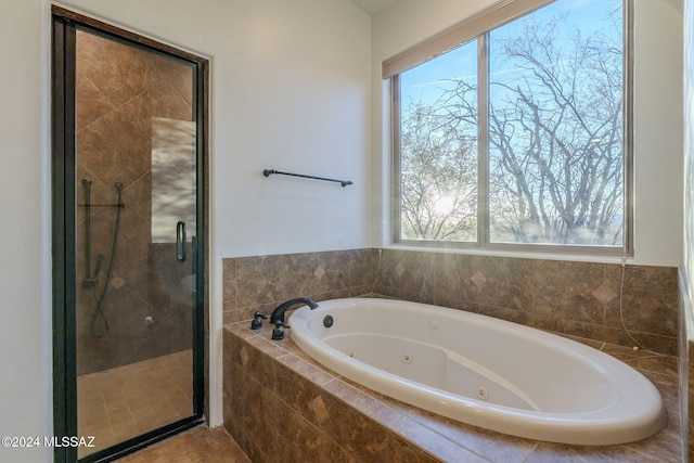 bathroom with independent shower and bath