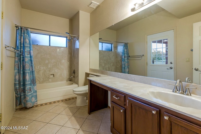 full bathroom featuring vanity, toilet, shower / bathtub combination with curtain, and tile patterned flooring