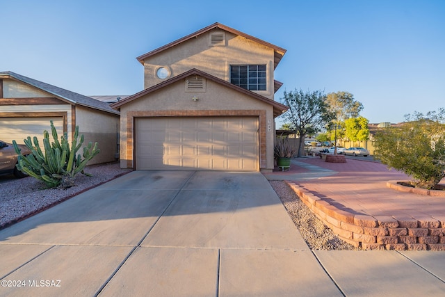 view of front of home with a garage