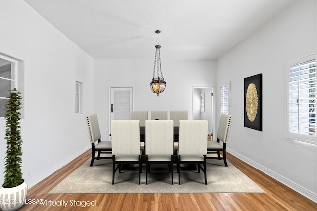 dining space featuring hardwood / wood-style flooring