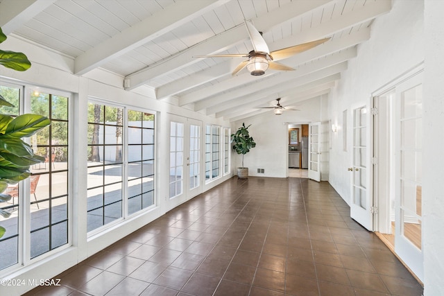 unfurnished sunroom with french doors, ceiling fan, and lofted ceiling with beams