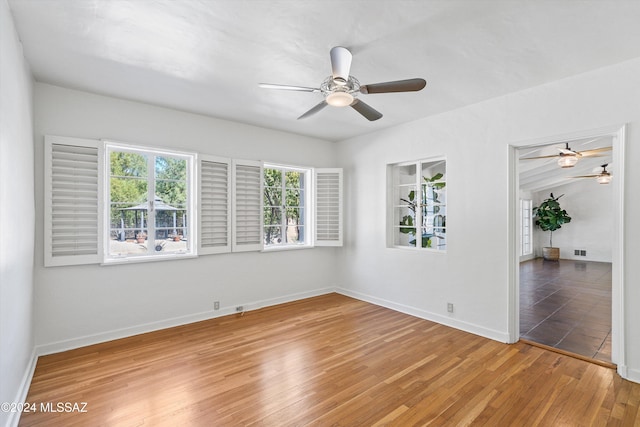 unfurnished room featuring wood-type flooring and ceiling fan