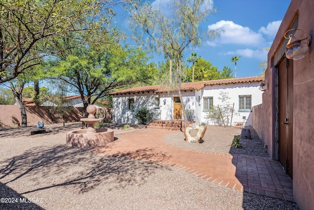 back of house featuring a patio area