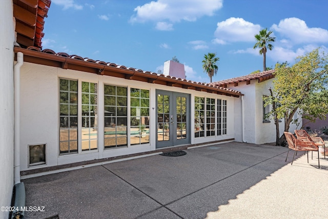 view of patio / terrace featuring french doors