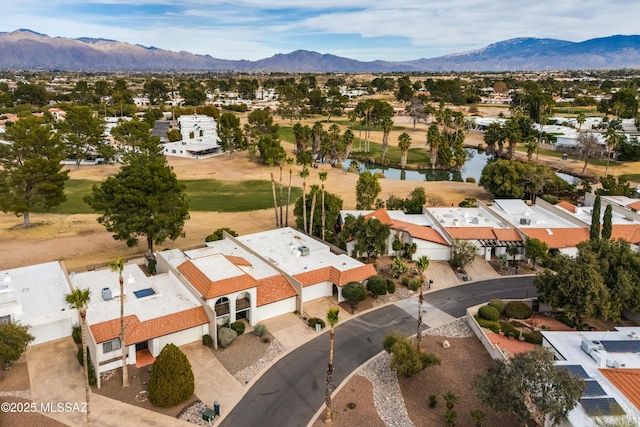 bird's eye view featuring a water and mountain view and a residential view