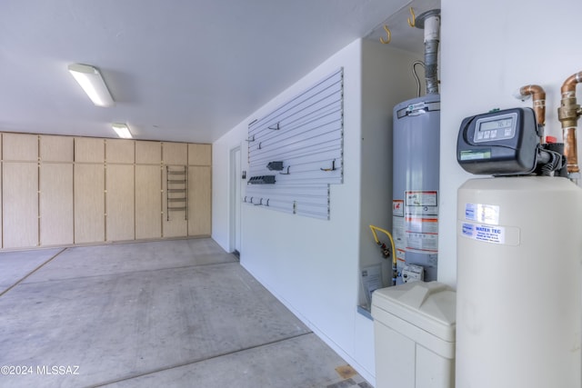 garage featuring gas water heater