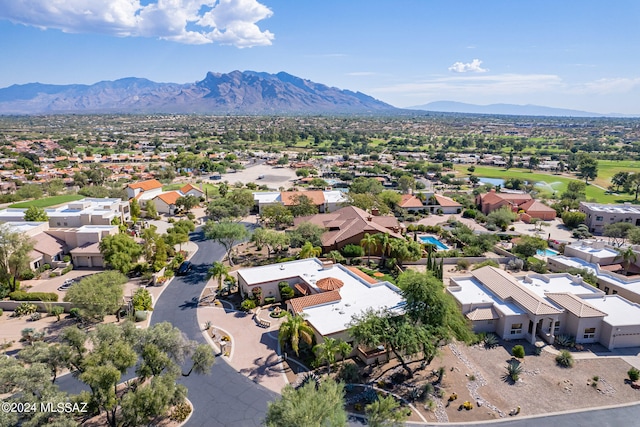 drone / aerial view featuring a mountain view