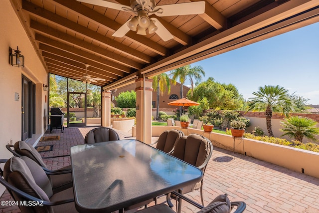 view of patio featuring ceiling fan