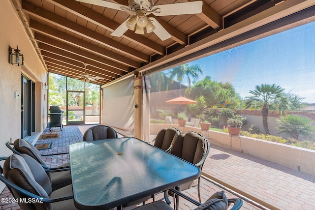 view of patio / terrace with area for grilling and ceiling fan