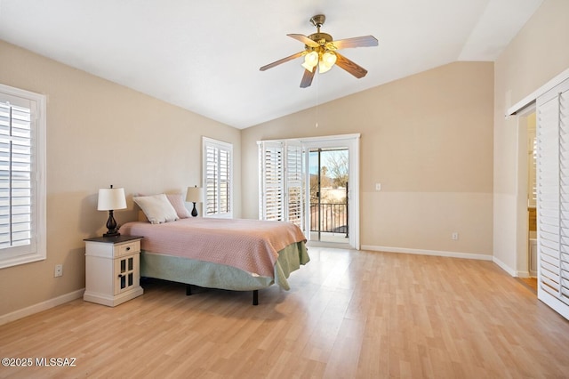 bedroom featuring vaulted ceiling, access to outside, ceiling fan, and light hardwood / wood-style flooring