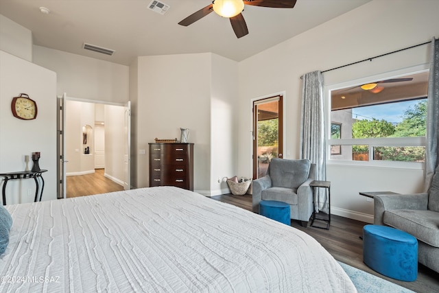 bedroom with wood-type flooring and ceiling fan