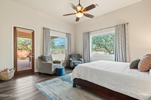 bedroom with ceiling fan and hardwood / wood-style floors