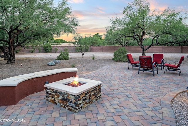 view of patio with area for grilling and ceiling fan