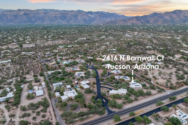 aerial view at dusk with a mountain view