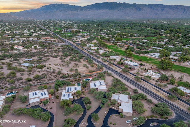 aerial view at dusk with a mountain view