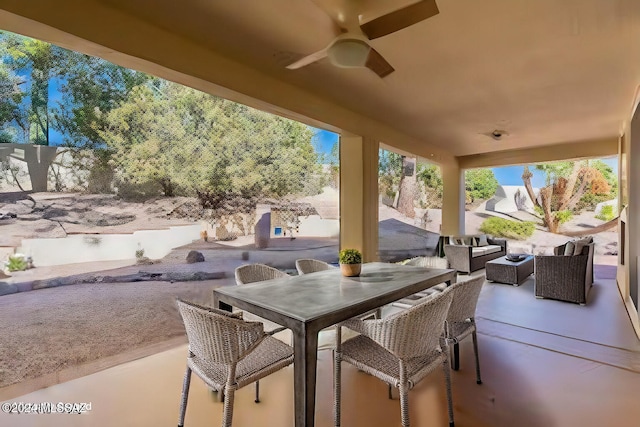 view of patio featuring an outdoor living space and ceiling fan