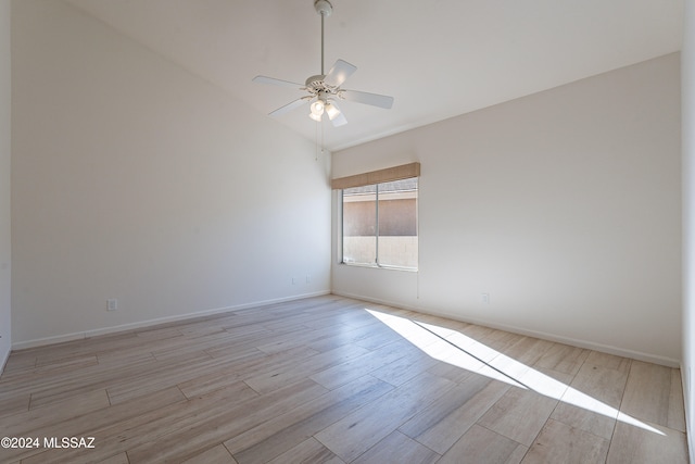 empty room featuring light hardwood / wood-style floors and ceiling fan