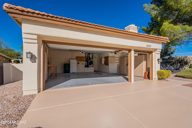 garage featuring white refrigerator