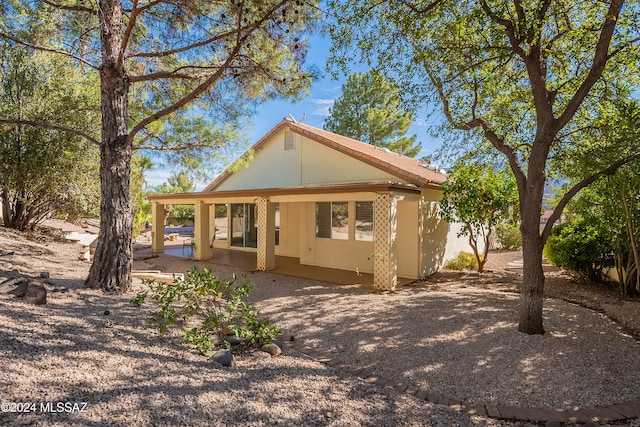 rear view of property with a patio