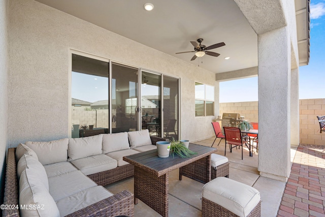 view of patio / terrace featuring an outdoor living space and ceiling fan