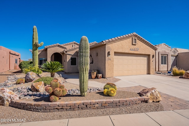 view of front of home with a garage