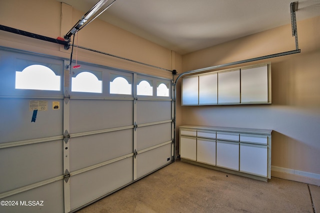 garage featuring baseboards