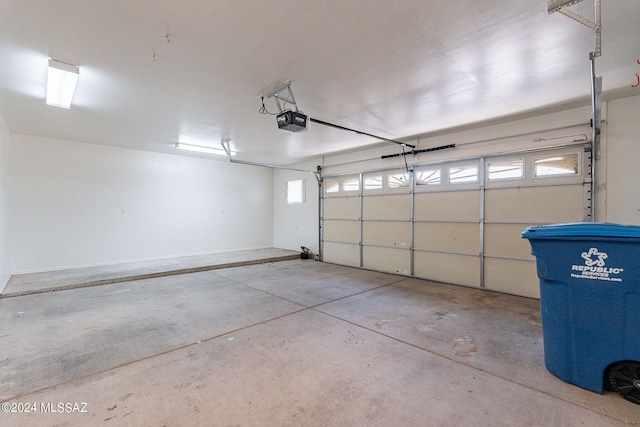 garage featuring a garage door opener