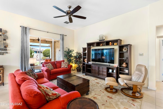 living room with ceiling fan and light tile patterned floors