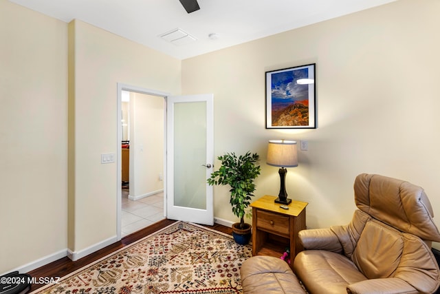 sitting room with light wood-type flooring