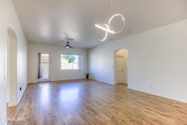 spare room featuring light hardwood / wood-style flooring and ceiling fan