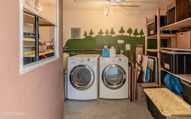 laundry area featuring washing machine and clothes dryer