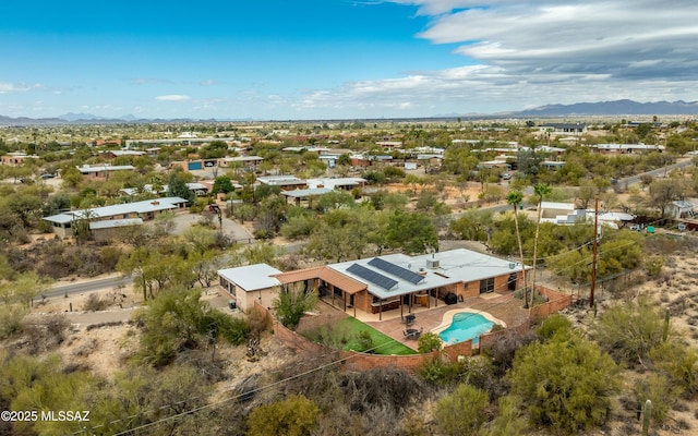 drone / aerial view featuring a mountain view