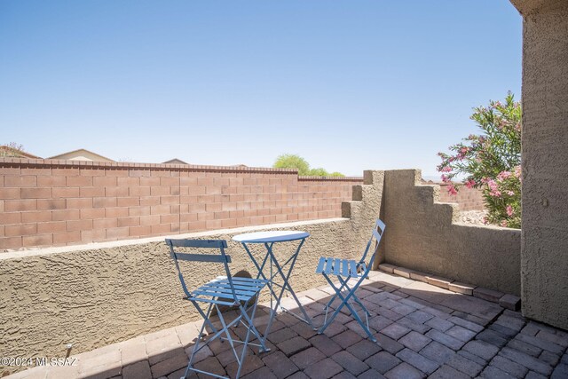 view of patio with fence