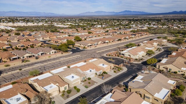 drone / aerial view with a residential view and a mountain view