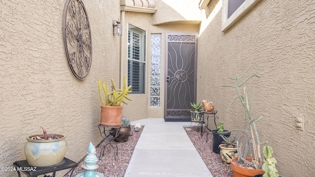 542 W Shadow Wood St, Green Valley, AZ 85614 - view of exterior entry with stucco siding