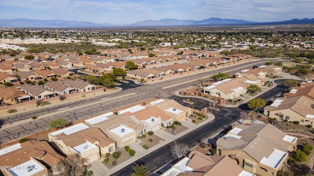 542 W Shadow Wood St, Green Valley, AZ 85614 - aerial view of property's location with nearby suburban area and a mountain backdrop