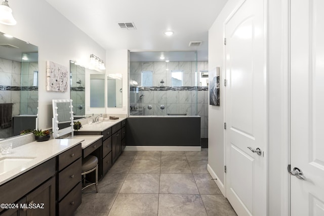 full bathroom with a walk in shower, visible vents, and vanity