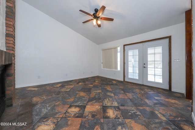 interior space featuring ceiling fan, vaulted ceiling, and french doors