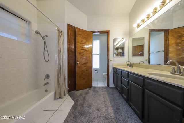 full bathroom with tile patterned flooring, vanity, shower / tub combo with curtain, and toilet